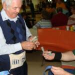 No, PDG Ron Peters is Not placing bets on what team will have the highest score. He is selling 50/50 tickets.