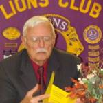 Lion Paul Smoker from the Intercourse Lions Club looks over the program for the night. He was recognized for his Service with a PA Fellowship later in the night.