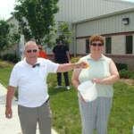 Lion Ernie and District treasurer Deb 
had fun collecting bottle caps