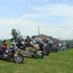 All the Bikes were resting in a row. 
Please don’t push the first one over.